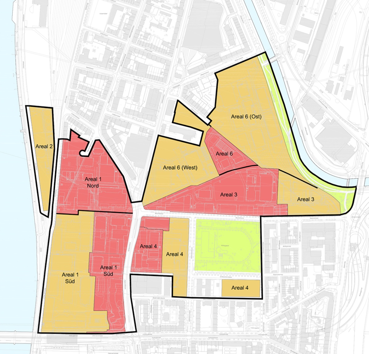 Die Werkareale von BASF (rot) und von Novartis (gelb) sowie die angrenzenden öffentlichen Grün- und Freiräume bilden zusammen das Planungsgebiet von klybeckplus zwischen Rhein und Wiese. Links unten ist die Dreirosenbrücke zu sehen.